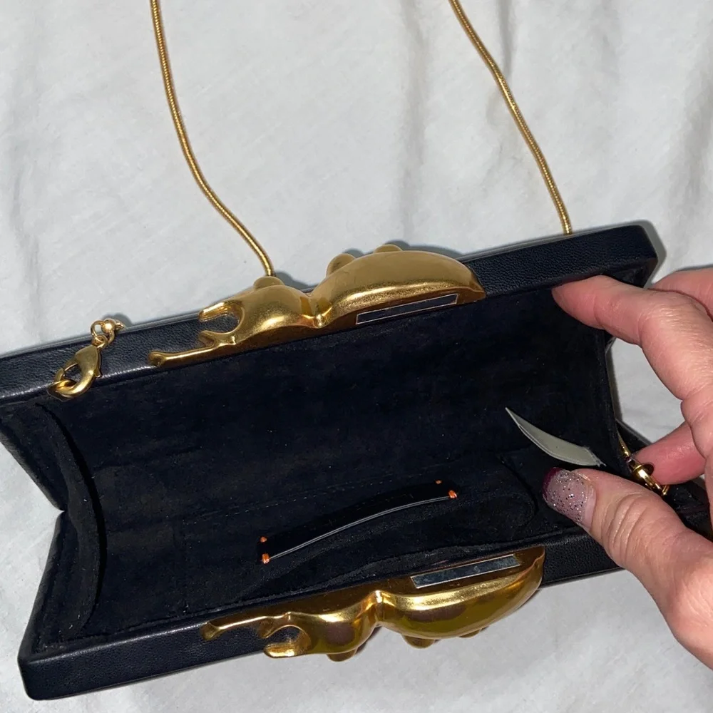 Like new HTF RARE India Hicks “Amulet” golden boy lucky beetle clutch/crossbody